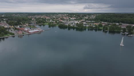 Aerial-establish-beautiful-coastal-city-Motala-in-Sweden-on-a-cloudy-day