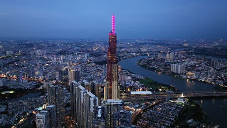 Landmark-81-Skyscraper-Illuminated-at-night---Aerial-Orbit