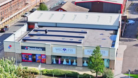 Commercial-Building-With-Pizza-And-Wedding-Stores-In-Rotherham,-South-Yorkshire,-UK