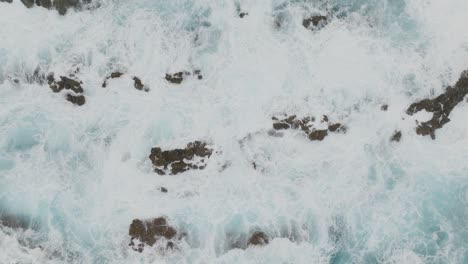 Ocean-waves-hits-the-rocks---aerial-drone-stock