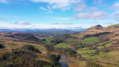 Aerial-Panoramic-View-Over-Scottish-Village-And-Green-Beautiful-Countryside