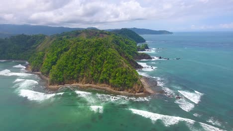 Aerial-shot-of-the-beautiful-Playa-Herradura-in-Costa-Rica-on-a-sunny-summer-day-in-Central-America