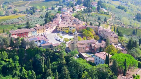 Marketplace-Smooth-aerial-top-view-flight-Tuscany-Medieval-Village-Mediterranean-Wine-growing-region-panorama-orbit-drone