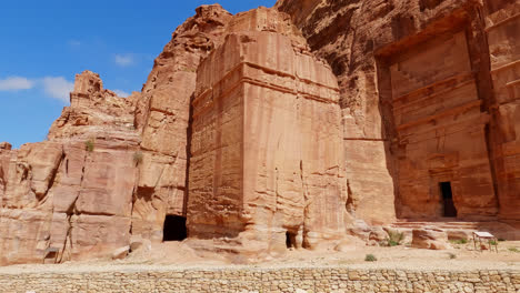 Panning-shot-of-the-ancient-ruins-of-royal-tombs-carved-in-Petra-Jordan