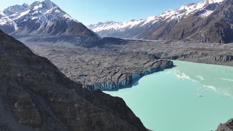 Spectacular-aerial-view-of-Tasman-Glacier-and-lake,-late-winter-in-New-Zealand,-sunny-day