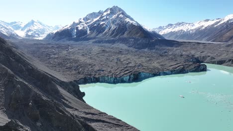 Tasman-Lake-with-long-glacier-in-valley-and-snow-capped-mountains