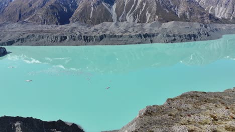 Beautiful-glacial-water-of-Tasman-Lake,-drone-reveals-scenic-mountain-vista