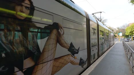 Tram-Arrives-at-Public-Transit-Stop-in-Rome,-Italy