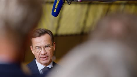 Swedish-Prime-Minister-Ulf-Kristersson-giving-a-statement-at-the-European-Council-summit-in-Brussels,-Belgium---Slow-motion