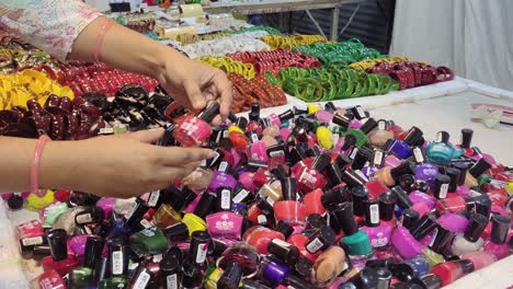 An-Indian-young-girls-shopping-for-nail-polish