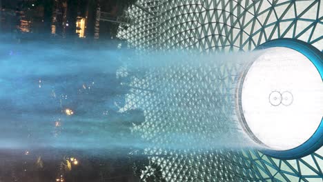 The-Magnificent-Blue-Illuminated-Rain-Vortex-Waterfall-Located-At-Jewel-Changi-Airport