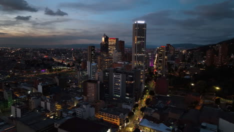 Aerial-view-around-the-skyline-of-Bogota,-colorful-evening-dusk-in-Colombia
