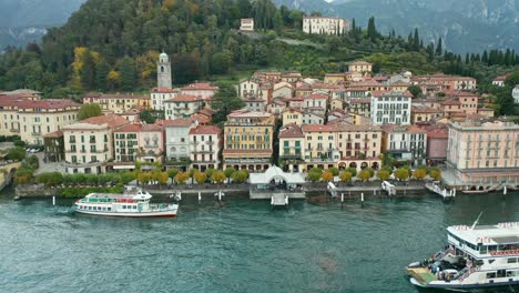 AERIAL:-Ferries-Travel-near-the-Coast-of-Bellagio-Town-in-Lake-Como