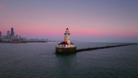 Chicago-lighthouse-with-city-skyline-in-background-at-sunrise-aerial