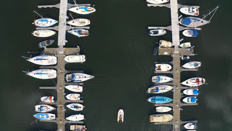 Top-aerial-view-of-boats-in-marina-in-Blotnik,-Pomeranian,-Poland