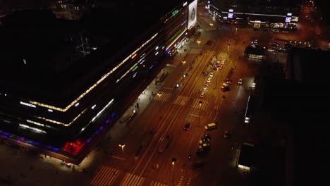 Night-flyover-of-Citycenter-Mall,-Kauppakeskus,-in-Helsinki-Finland