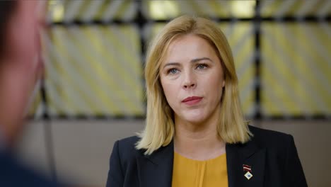 Latvian-Prime-Minister-Evika-Siliņa-talking-to-the-press-at-the-European-Council-summit-in-Brussels,-Belgium---Close-shot,-Slow-motion