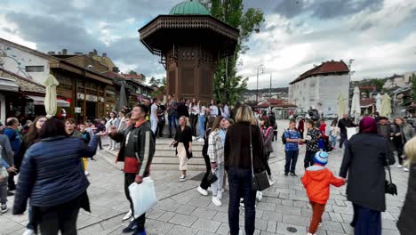 SARAJEVO:-East-meets-West,-Gazi-Husrev-beg-Mosque,-Cinematic-Shots,-Wide-Angle-Lens,-Sunset,-Latin-Bridge,-Clock-Tower,-Gazi-Husrev-beg-Mosque,-Olympic-Spirit,-Sebilj-Fountain