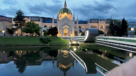 SARAJEVO:-Strolling-along-the-Miljacka-River-with-a-view-of-the-Fine-Arts-in-Sarajevo