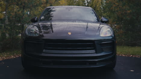 Front-View-Of-Luxury-Car-Porsche-Macan-In-Jet-Black-Metallic
