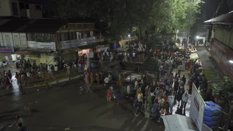 Aerial-of-the-crowd-of-Hindu-devotees-approaching-Kushavarta-Kund-to-take-holy-dip-early-morning-during-the-month-of-Shravana-near-Trimbakeshwar-temple