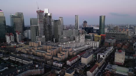Skyscrapers-at-Isle-of-Dogs-in-London-CBD,-aerial-view-of-skyline-at-twilight