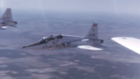 1960s-US-Military-Aircraft-Formation-Close-Up-from-Pilot-Cockpit-POV