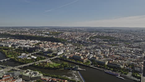 Prague-Czechia-Aerial-v58-drone-flyover-Holesovice-capturing-panoramic-cityscape-views-of-Stvanice-Island,-Vltava-River,-Karlin,-Petrska-Ctvrt-and-Old-Town---Shot-with-Mavic-3-Cine---November-2022