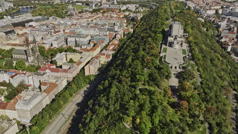 Prague-Czechia-Aerial-v52-drone-flyover-Karlin-capturing-national-memorial-and-history-museum-at-Vítkov-Hill-and-views-of-Zizkov-cityscape-and-television-tower---Shot-with-Mavic-3-Cine---November-2022