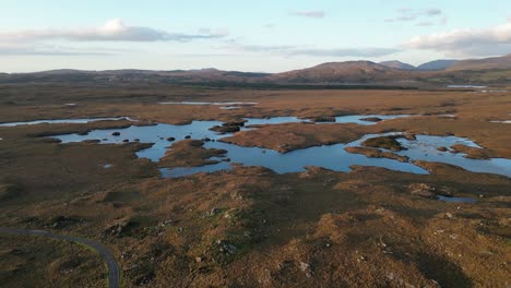 Aerial-of-Connemara,-Roundstone-Bog---natural-wonder-that-beckons-with-its-unique-and-mysterious-allure