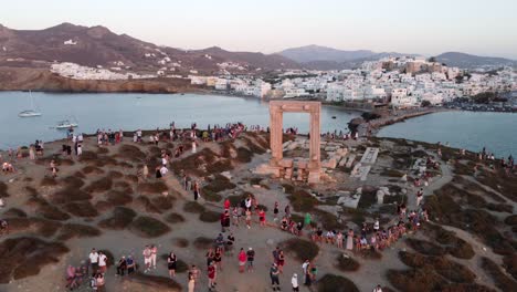 Tourists-enjoying-sunset-at-Naxos-island-Temple-of-Apollo-,Greece,-Aerial-view