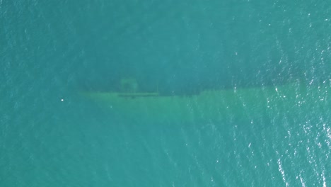 Aerial-Sliding-Shot-Above-Shipwreck-in-Saranda,-Albania