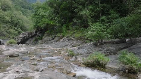 River-water-flows-through-the-Rocky-Canyons-in-Salto-Las-Yayitas,-El-Recodo,-Bani,-Dominican-Republic,-Peravia-Province