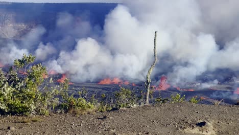 Cinematic-wide-panning-shot-of-lava-and-volcanic-gasses-emitting-from-Kilauea-on-the-first-day-of-eruption-in-September-2023-at-Hawai'i-Volcanoes-National-Park