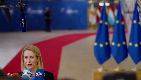 Estonian-Prime-Minister-Kaja-Kallas-talking-to-the-press-at-the-European-Council-summit-in-Brussels,-Belgium---Cinematic-close-shot