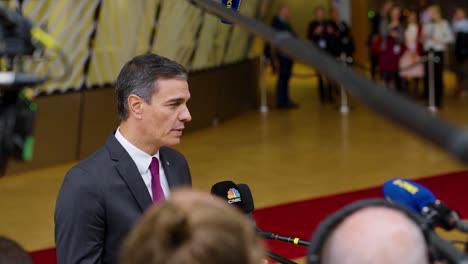 Spanish-Prime-Minister-Pedro-Sánchez-giving-a-statement-at-the-European-Council-conference-in-Brussels,-Belgium---Medium-shot