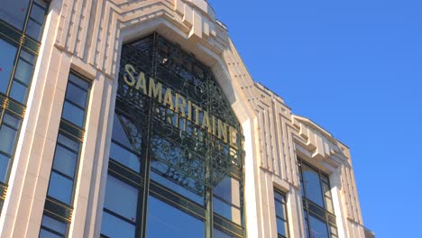 Low-angle-capture-of-a-large-shopping-mall-in-Paris-with-several-stores-selling-luxury-items