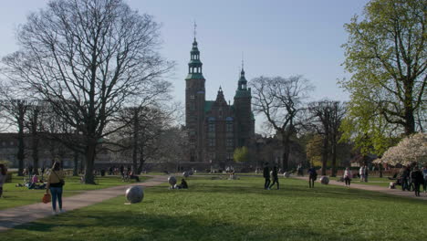 Peaceful-park-scene-with-historic-Rosenborg-Castle-in-background