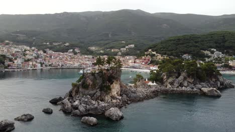 Aerial-view-of-Parga-Greek-town-skyline-at-the-Ionian-coast-with-Chapel-of-the-Assumption-of-the-Virgin