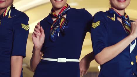 Cabin-crew-dancing-with-joy-in-airplane