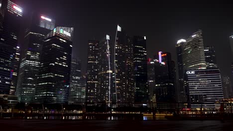 Singapore-Finance-District-Skyline-And-Waterfront-At-Night