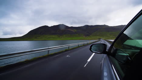 Woman-tourist-travel-by-SUV-car-in-Iceland.