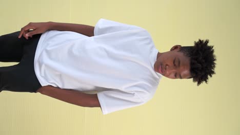 Vertical-video-of-young-African-American-teenager-portrait-middle-shot