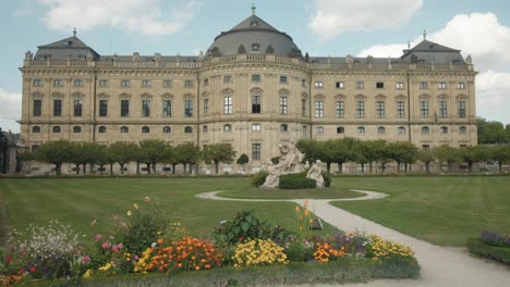 Establishing-pan-across-Wurzburg-Residence-and-triumphant-sculpture-in-front-garden