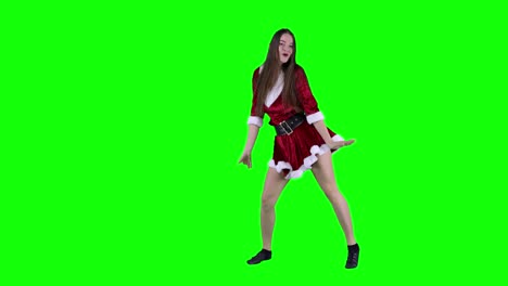 Caucasian-American-woman-celebrating-Christmas-dancing-video-in-front-of-the-green-screen