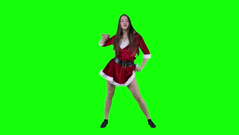 Bailarina-Vestida-De-Papá-Noel-En-Una-Fiesta-De-Año-Nuevo-En-Un-Estudio-Interior-Bailando-Frente-A-Una-Pantalla-Verde,-Una-Mujer-Emocionada-Y-Una-Clave-De-Croma-Energética