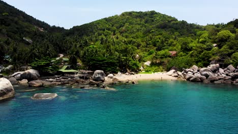 Above-Aerial-Perspective-of-Ao-Hin-Wong-Beach-on-Koh-Tao-Island,-Thailand