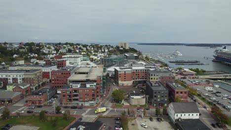 Aerial-Flyover-Of-Waterfront-Harbor-In-Portland,-Maine