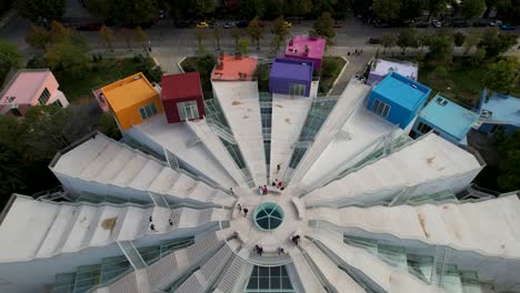Star-Shape-Colorful-Pyramid-of-Tirana,-an-Architectural-Legacy-from-the-Socialist-Era,-Amidst-the-Capital's-History-and-Modern-Buildings