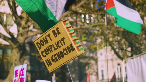 "Don't-Be-Complicit-In-Genocide"---Protest-Placard-at-National-March-for-Palestine-and-Gaza-in-London,-UK